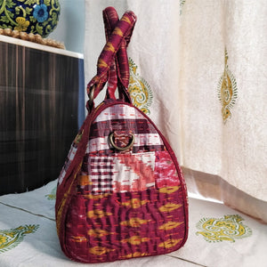 Beautiful maroon white check multicolor Kantha Ikat handcrafted silk duffle bag I Chanchal bringing art to life 