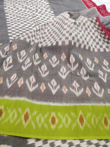 Beautiful, Grey Ikkat Cotton Saree, green and red border, soft cotton sari, gorgeous. elegant, handloom, festive wear, Durga puja, Ganapati, office wear, ethnic collection, traditional dress, Chanchal bringing art to life.