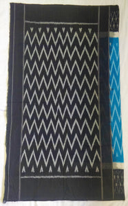 Chanchal, beautiful Ikat soft cotton sari, blue color with white chevron patterns, black border with motifs, black pallu chevron pattern, office wear, handwoven, casual wear.