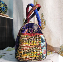 Load image into Gallery viewer, Beautiful purple golden multicolor Kantha Ikat handcrafted silk duffle bag I Chanchal bringing art to life 