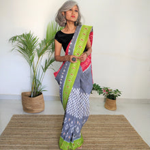 Load image into Gallery viewer, Beautiful, Grey Ikat Cotton Saree, green and red border, soft cotton sari, gorgeous. elegant, handloom, festive wear, Durga puja, Ganapati, office wear, ethnic collection, traditional dress, Chanchal bringing art to life.