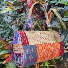 Load image into Gallery viewer, Classy golden orange multicolor Kantha Ikat handcrafted silk duffle bag I Chanchal bringing art to life 