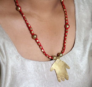 Dokra, palm pendant, red golden, brass, handcrafted, artisan, made in India, stylish neckpiece Chanchal 