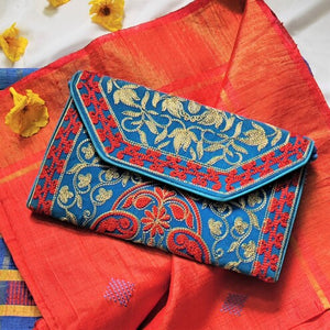 Festive sky blue handmade clutch I Online clutch I Rajasthani embroidery I Chanchal bringing art to life