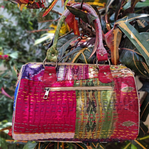 Gorgeous sky golden multicolor Kantha Ikat handcrafted silk duffle bag I Chanchal bringing art to life 